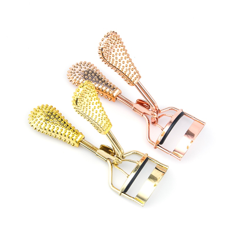 Rose gold lash curler.jpg